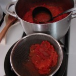 Straining Tomato Pulp, Photo: Eric Colleary
