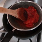 Straining Tomato Pulp, Photo: Eric Colleary